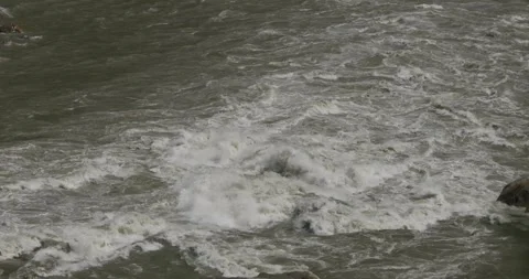 River Indus, it's full speed and water splashes Stock Footage 245443940