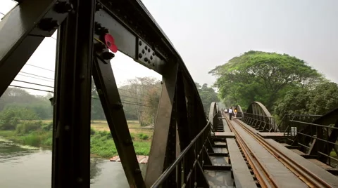River Kwai world war 2 rail bridge rail track perspective with red poppy on blac Vidéo 61812895