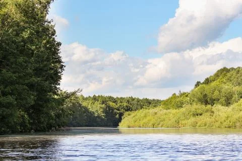 River landscape with clouds. Stock Photos