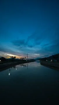 River Landscape at Dusk with Dramatic Sky 스톡 사진