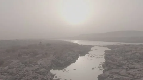 River Landscape Flows Rocky Terrain Wide - Ungraded Stock Footage 322542509