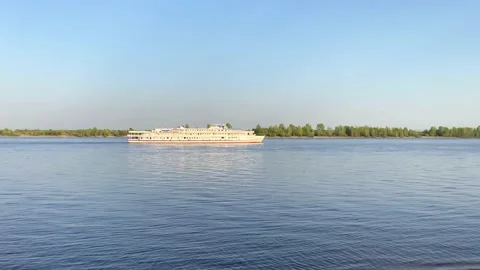 River landscape with white ship. Blue sky, summer. Video stock 157328044