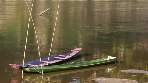 River in Laos. Boat park at riverside Stock Footage 74684389