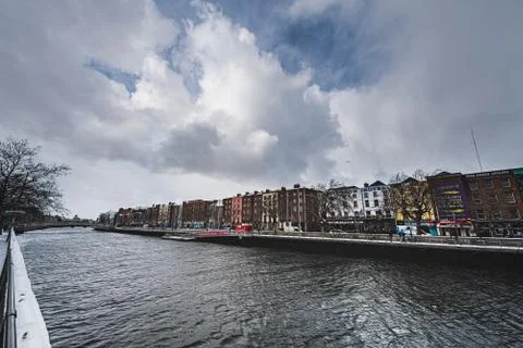 River Liffey waterfront dramatic view from the historical O' Connell Bridge Stock Photos
