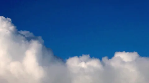 River of lumpy fluffy clouds on deep blue sky background. Meditative view. Stock Footage 38613334