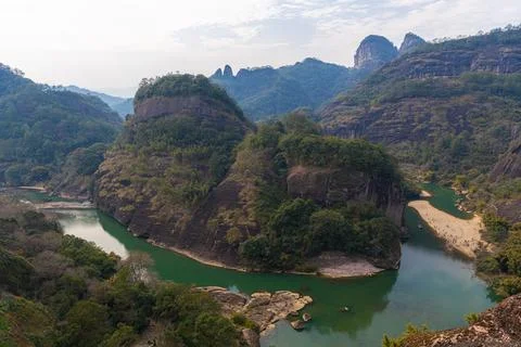 River making a 360 degree turn in front of a stiff rock in Wuyishan China Stock Photos