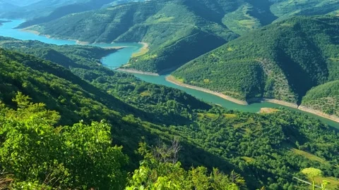River meanders through valley's embrace. Kozji Kamen viewpoint, Serbia Stockbeeldmateriaal 342341312