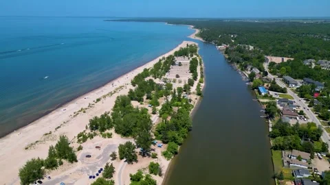 River Meets Lake Huron at Wasaga Beach Stock Footage 339875919