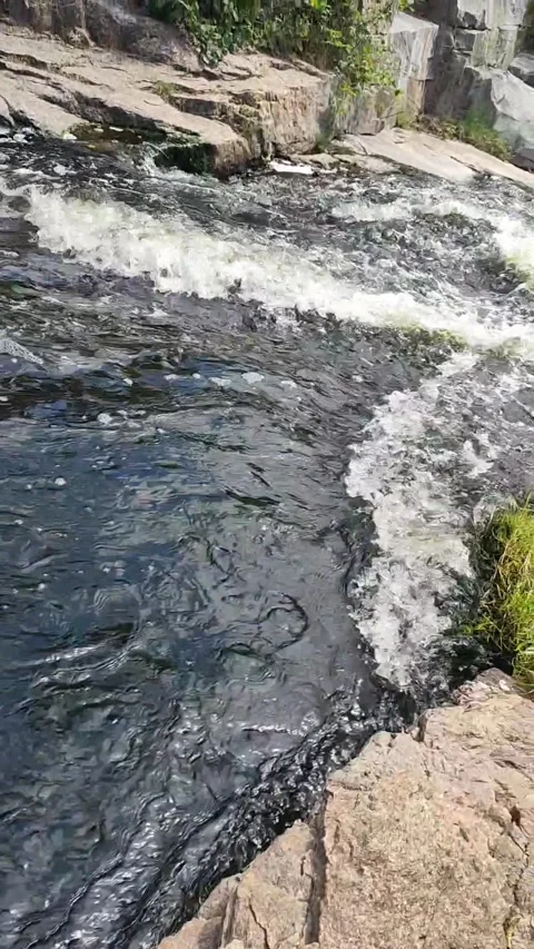 A river in the middle of a beautiful canyon Stock Footage 250650708