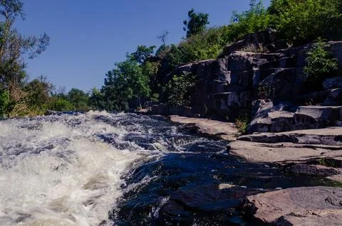 A river in the middle of a beautiful canyon Stock Photos
