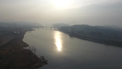 River with mountain and bridge, drone shot Stock-Footage 303031534