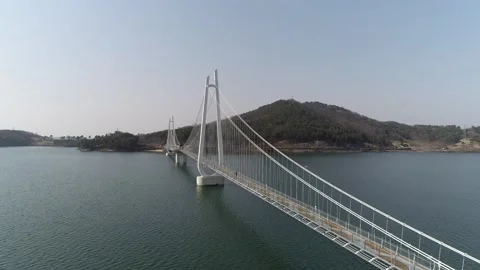 River with mountain and bridge Video stock 303539885
