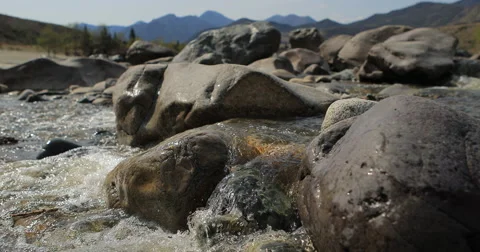 River in mountain valley at the foot  mountains. Landscape. Stock Footage 62922500