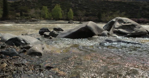 River in mountain valley at the foot  mountains. Landscape. Stock Footage 62923088