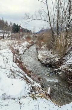 River mountain in winter time with ice and snow Stock Photos