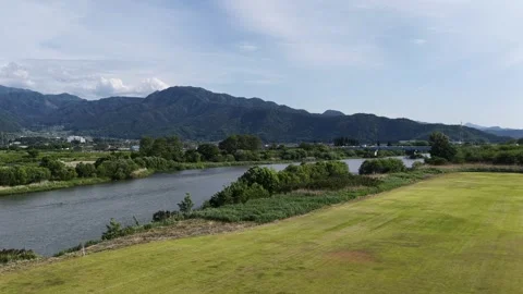 River Mountains Bridge and Road Traffic in Nagano Japan Stock Footage 336617026