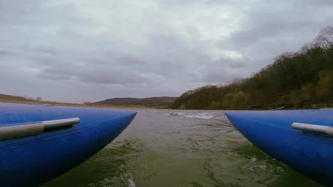 River in mountains. Close-up shot of blue raft. Outdoors. Footage. Spring time 스톡 동영상 105367578