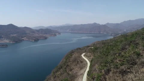 River in the mountains, drone shot 스톡 동영상 303131174