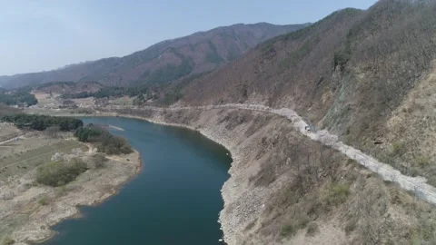 River in the mountains, drone shot 스톡 동영상 303131255