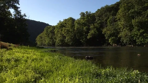 River at Mountain's edge Stock Footage 69776641