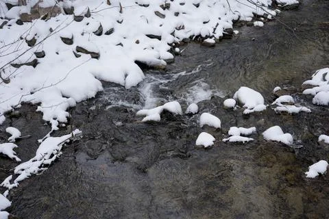 River in the mountains in winter Stock Photos