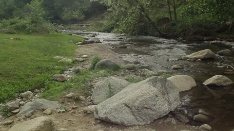 River Nature Day Green Reflection Sky Water Forest Mountain Stones Stock-Footage 75801654