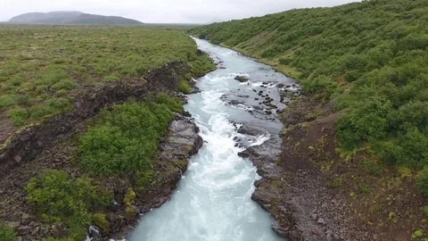 River near Hraunfossar waterfall Stock Footage 77401322