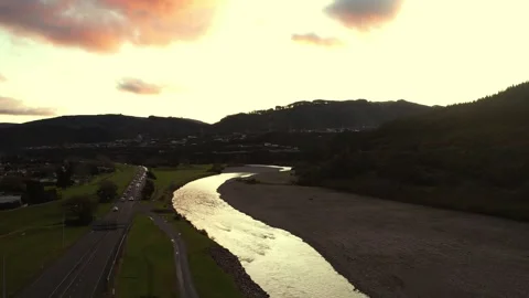 River Next To Road Into Sunset. 스톡 동영상 255746521