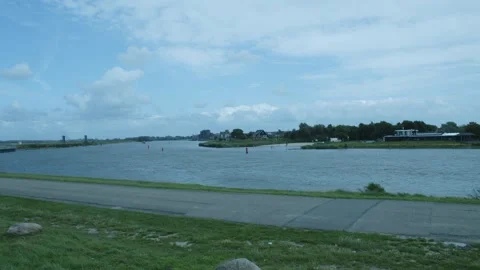 River Next To Walking Path Of Grass Video stock 247141398