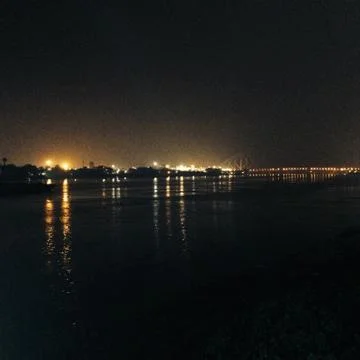 By the river at night Foto stock