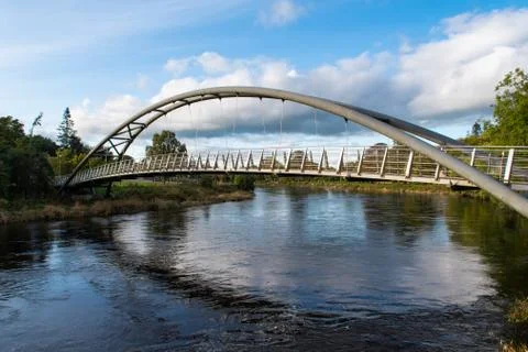 River Nith and Kirkpatrick Macmillan Pedestrian Bridge in Dumfries Stock Photos