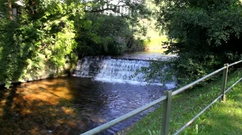 River Oos with waterfall In Baden-Baden. Germany Stock Footage 43148001