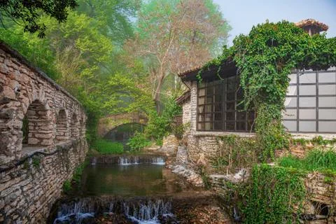 River or stream in the middle of the old city. Stock Photos
