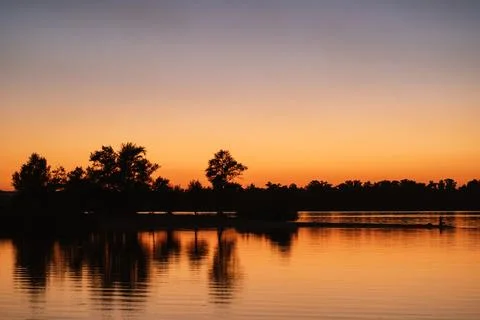 River in the orange sunset light Stock Photos