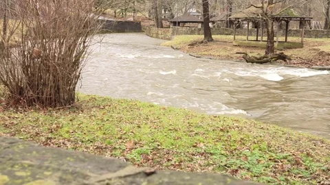 River overflowing after rain storm Stock Footage 71898408