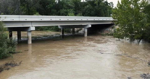 River overflowing river during a storm Stock Footage 98217271