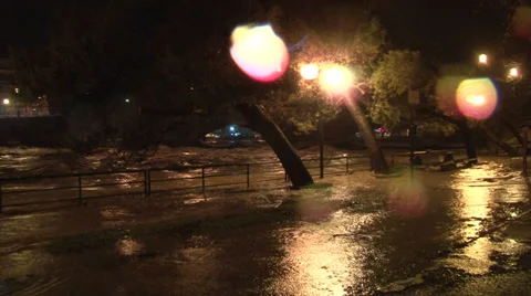 River overflowing on side walk Stock Footage 37090498