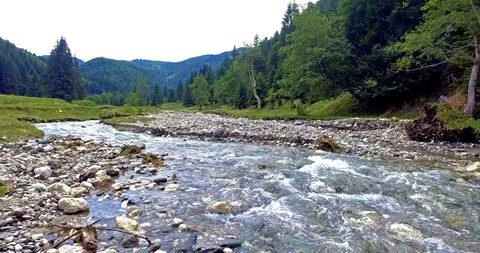 River pan and green mountain Stock Footage 102889718