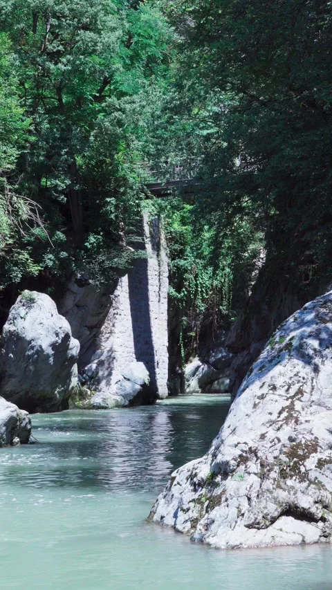 The river Passer flows through a canyon in Meran, South Tyrol Stock Footage 247325827