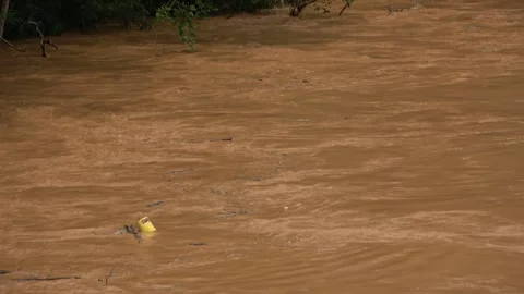 River pollution after soil erosion, Malaysia Stock Footage 311771626