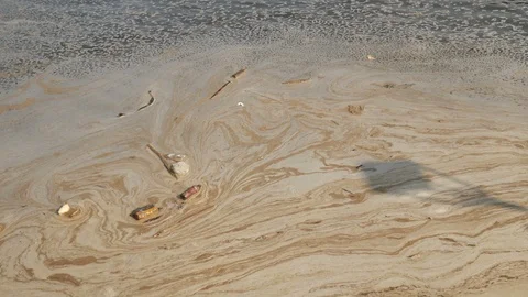 River pollution with plastic bottles and fast food container Stock Footage 106138356