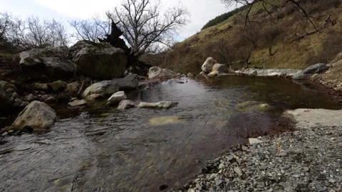 River pooling into a tiny lake near the town of Sopot, Bulgaria. Stock Footage 236992323