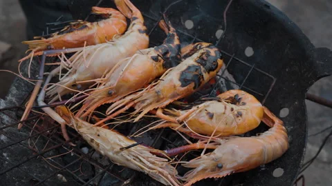 River prawn shrimp burn and grilled on fired outdoor party camping Stock Footage 301373302