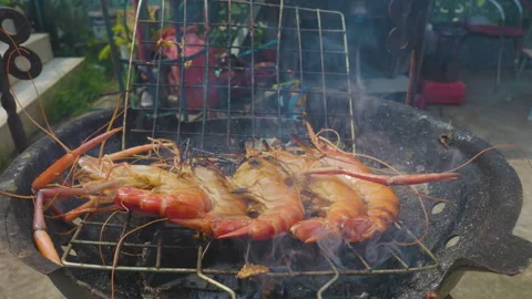 River prawn shrimp grilled fire party Stock Footage 287894149