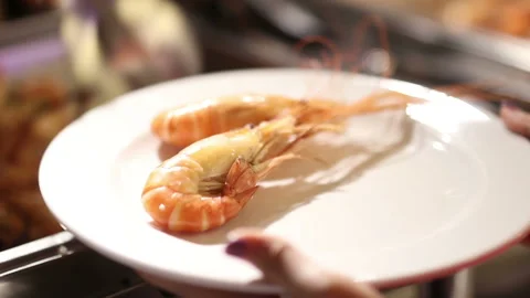 River prawns are served on a plate Stock Footage 139902197