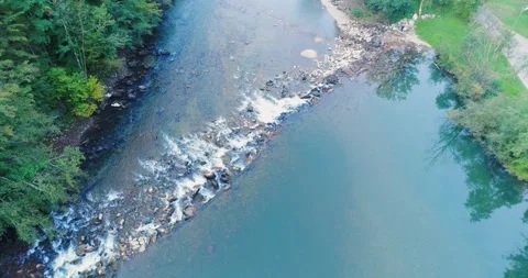 River rapids and rocky riverbed in Kostel, Slovenia, Stock Footage 326196857