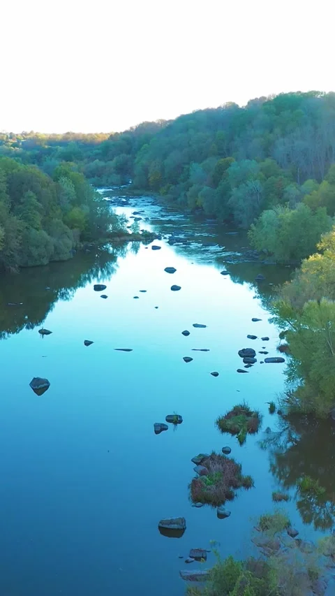 River with rapids. Beautiful fall nature by the river. Vertical video. Stock-Footage 288219438