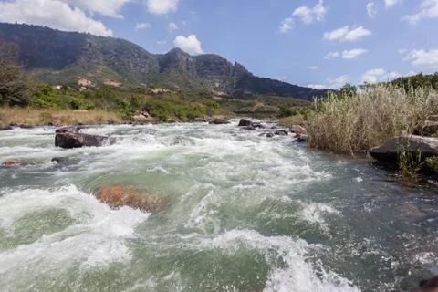 River rapids power valley Stock Photos