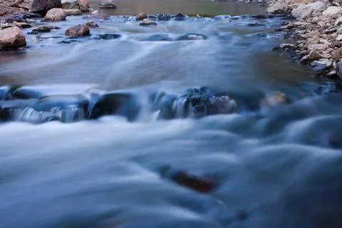 River rapids running fast. Stock Photos