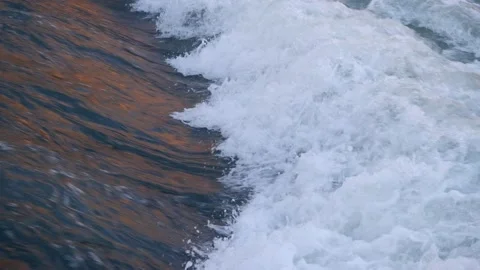 River rapids swiftly flowing through a cold, colorful autumn scene Stock Footage 171403858